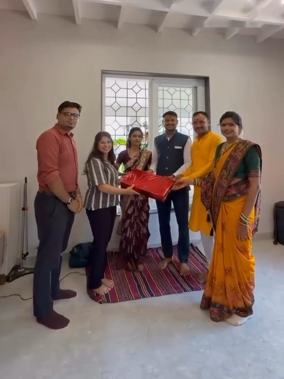 The family and architect in their finished home at the griha pravesh